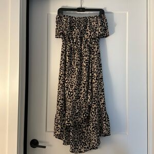 Animal print strapless dress. With ruffle on the bottom. In great condition.